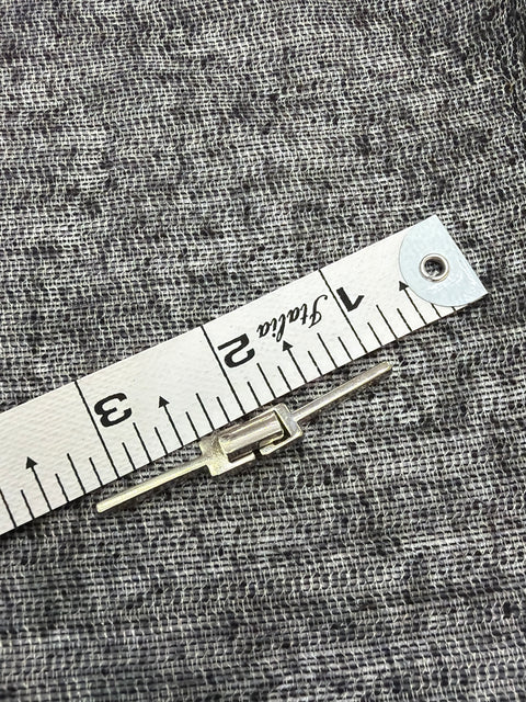 Sleek Metallic Suit Buckle